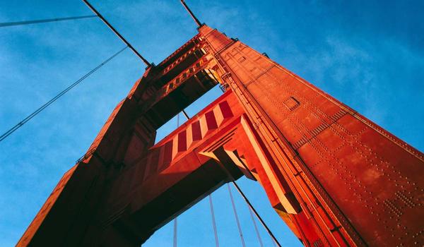 Digital tournament bracket display on dark background with neon pink progress bars and glowing match highlights, futuristic UI design